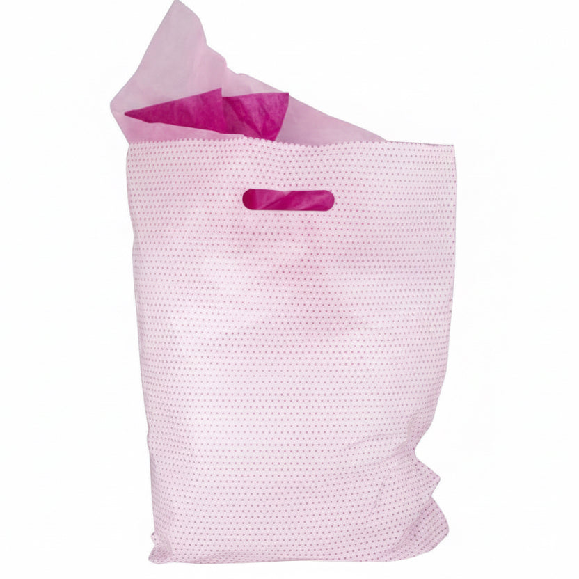 Hvid plastpose med pink prikker og forstærket håndtag