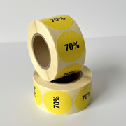 Gult rabattklistremerke 70%. Rull med 500 stk. Ø 30 mm.