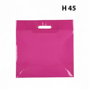 Plastpose, stor, rosa, pk. med 100 stk., 50 mikron, B 56 x D/BF 10 x H 45 cm, forsterkede håndtak